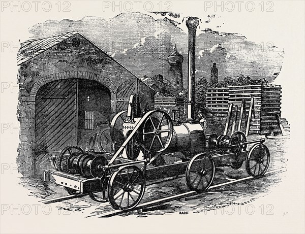 TUXFORD AND SONS' STEAM PILE-DRIVING ENGINE, WITH TWO DOUBLE ACTING PURCHASES FOR LIFTING FOUR RAMS AT A TIME.