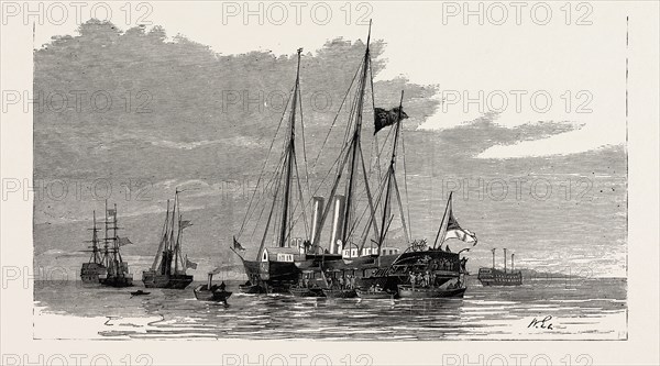 THE LATE DUKE OF ALBANY: THE ROYAL YACHTS "OSBORNE" AND "ALBERTA," AND THE ADMIRALTY YACHT "ENCHANTRESS," BEING DRAPED IN BLACK IN PORTSMOUTH HARBOUR THE EVENING BEFORE THEIR DEPARTURE FOR CHERBOURG