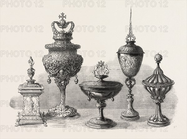 OBJECTS OF ART AND ANTIQUITY EXHIBITED AT IRONMONGER'S HALL: VINTNER'S SALT-CELLAR (LEFT), ROYAL OAK GRACE-CUP (SECOND FROM LEFT), BARBER-SURGEON'S CUP, PRESENTED BY HENRY VIII (CENTRE), CARPENTERS' CUP (SECOND FROM RIGHT), ARMOURERS' CUP (RIGHT)