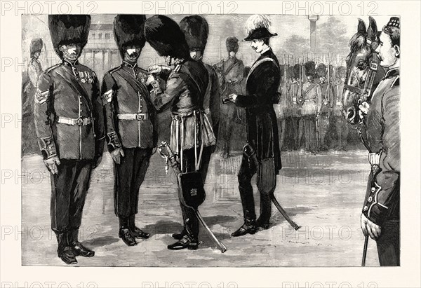 THE PRESENTATION OF MEDALS TO GUARDSMEN ON THE HORSE GUARDS' PARADE IN RECOGNITION OF THEIR BRAVERY AT THE RECENT FIRE AT WELLINGTON BARRACKS