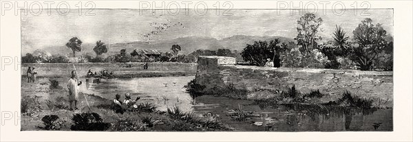 THE DISASTER TO BRITISH TROOPS IN MANIPUR, NORTHERN INDIA, THE SCENE OF THE FIGHTING: VIEW OF THE BRITISH RESIDENCY, MANIPUR, WHERE MR. QUINTON AND COL. SKENE WERE CAPTURED, SHOWING THE MOAT