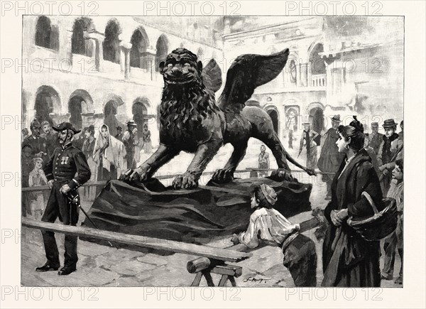 THE WINGED LION OF ST. MARK LYING IN THE PIAZZETTA SAN MARCO, VENICE, ITALY, AFTER BEING TAKEN DOWN FOR REPAIRS