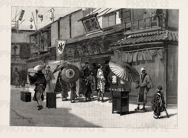 THE EXTERIOR OF A JAPANESE THEATRE; IN THE DISTRICT DEVASTATED BY THE EARTHQUAKES