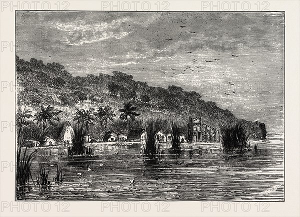 AN ENCAMPMENT ON THE SHORES OF LAKE TANGANYIKA, an African Great Lake. The lake is divided among four countries Tanzania, the Democratic Republic of the Congo, Burundi, and Zambia