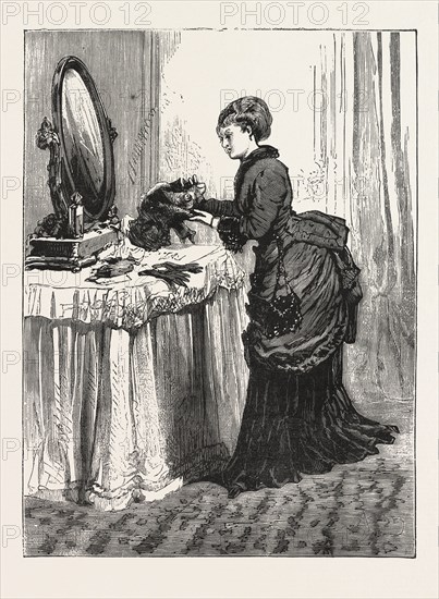 THE BIRD WEARER., WOMAN, FASHION, HAT, MIRROR, INTERIOR, DRESSING TABLE, ENGRAVING 1876, UK, britain, british, europe, united kingdom, great britain, european