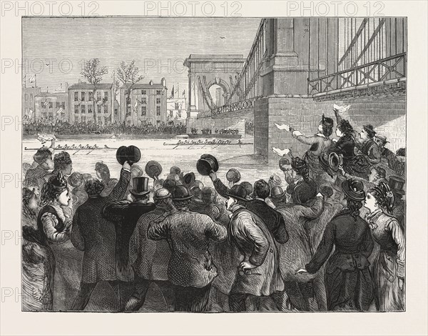 THE UNIVERSITY BOAT RACE THE STRUGGLE AT HAMMERSMITH BRIDGE. CAMBRIDGE LEADING, LONDON, ENGRAVING 1876, UK, britain, british, europe, united kingdom, great britain, european