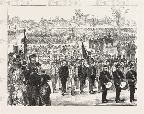 DRILL INSPECTION OF BOYS ATTENDING SCHOOLS UNDER THE CONTROL OF THE SCHOOL BOARD FOR LONDON, IN REGENTS PARK, LONDON, ENGRAVING 1876, UK, britain, british, europe, united kingdom, great britain, european