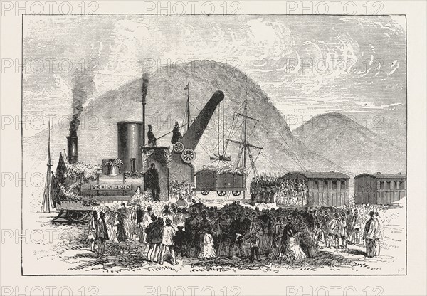RAILWAY ENTERPRISE IN NEW ZEALAND, HOISTING THE FIRST TRUCK OF COAL ON THE GREYMOUTH AND BRUNNERTON RAILWAY, ENGRAVING 1876