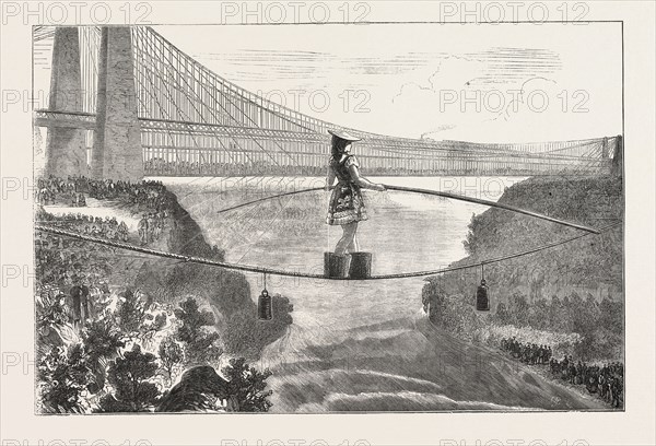 MDLLE. SPELTERINI CROSSING THE NIAGARA RIVER  ON A TIGHT ROPE, The Niagara River is a river that flows north from Lake Erie to Lake Ontario. It forms part of the border between the Province of Ontario in Canada (on the west) and New York State in the United States, ENGRAVING 1876