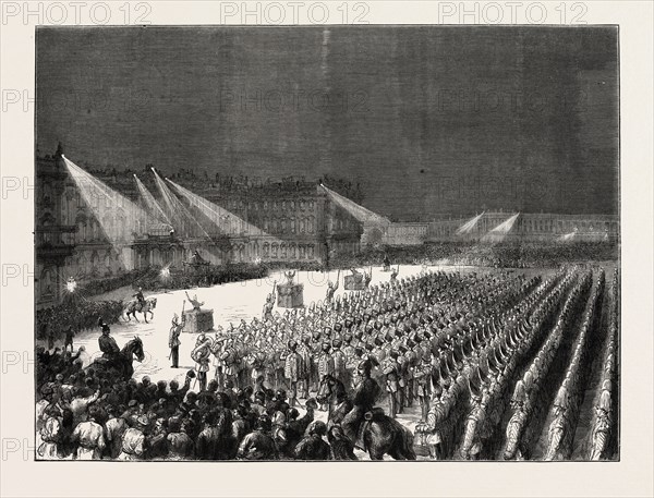 THE EMPEROR OF GERMANY AT ST. PETERSBURG, RUSSIA: MILITARY CONCERT BY ELECTRIC LIGHT BEFORE THE WINTER PALACE, 1873