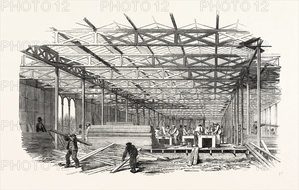 THE GREAT EXHIBITION: THE BUILDING OF THE CRYSTAL PALACE, THE SOUTH AISLE LOOKING WEST, LONDON, UK, 1851 engraving