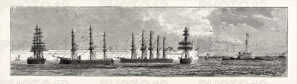 INAUGURATION OF THE HOLYHEAD BREAKWATER AND HARBOUR OF REFUGE BY H.R.H. THE PRINCE OF WALES: FLEET MANNING YARDS ON THE PRINCES LEAVING THE BREAKWATER; Hercules, Northumberland, Sultan, Devastation, 1873 engraving