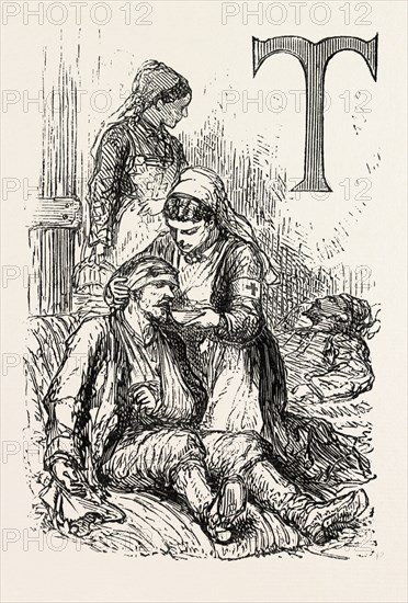 A NURSE WORKING FOR THE RED CROSS FEEDING A WOUNDED MAN