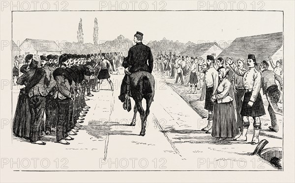 VOLUNTEERS FROM THE 79TH HIGHLANDERS LEAVING ENGLAND FOR THE ASHANTEE WAR: THE PARADE: PRINCE ARTHUR RIDING ALONG THE LINES, ANGLO ASHANTI WAR, GHANA, 1873 engraving