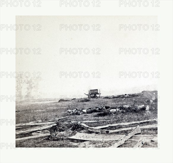 American Civil War: Where Sumner's Corps charged at Antietam, dead soldiers, horses, and broken gun carriages after General Sumner's Corps charged over this field on the battlefied of Antietam on Sept. 17, 1862. Photo, albumen print, By Alexander Gardner, 1821 1882, Scottish photographer who emigrated to the United States in 1856. From Gardner Photographic Art Gallery, Seventh Street, Washington