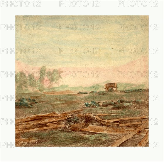 American Civil War: View on battle field of Antietam where Sumner's Corps charged the enemy. Scene of terrific conflict, devastation after the battle with dead soldiers on the battlefield and a wagon in the background. Photo, albumen print, By Alexander Gardner, 1821 1882, Scottish photographer who emigrated to the United States in 1856. From Gardner Photographic Art Gallery, Seventh Street, Washington