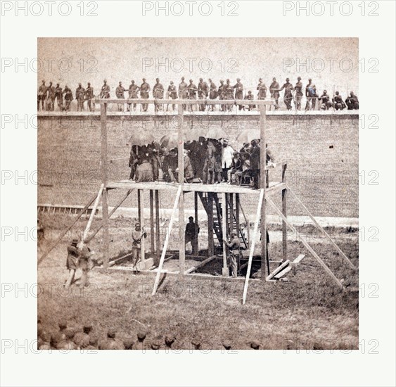 American Civil War: Execution of the conspirators. The arrival on the scaffold. July 7, 1865. Photo, albumen print, By Alexander Gardner, 1821 1882, Scottish photographer who emigrated to the United States in 1856. From Gardner Photographic Art Gallery, Seventh Street, Washington