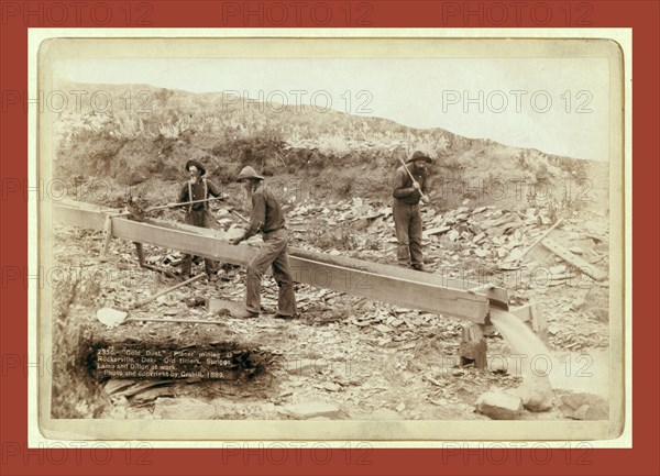 Gold Dust. Placer mining at Rockerville, Dak. Old timers, Spriggs, Lamb and Dillon at work, John C. H. Grabill was an american photographer. In 1886 he opened his first photographic studio