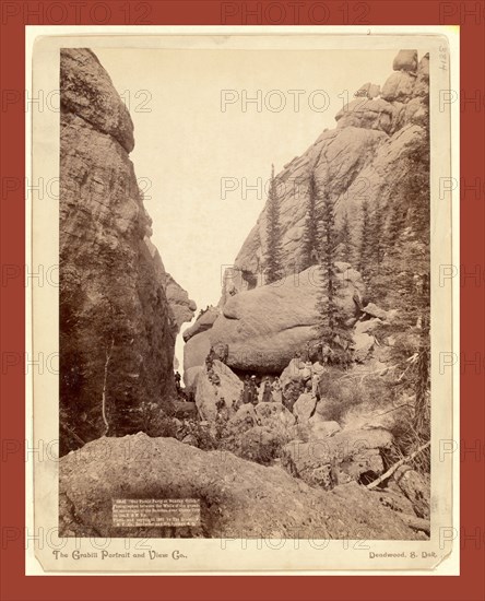 Our picnic party at Sunday Gulch. Photographed between the walls of the grandest mountains of the Dakotas, near Custer City on the B. & M. Ry, John C. H. Grabill was an american photographer. In 1886 he opened his first photographic studio