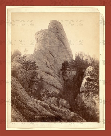 Calamnity, Calamity Peak. Near Custer City on B. & M. R'y. Title of Peak from the most noted character in Black Hills, John C. H. Grabill was an american photographer. In 1886 he opened his first photographic studio