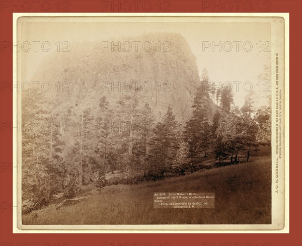 Little Missouri Butte. Largest of the 3 buttes, 4 miles from Devil's Tower, John C. H. Grabill was an american photographer. In 1886 he opened his first photographic studio