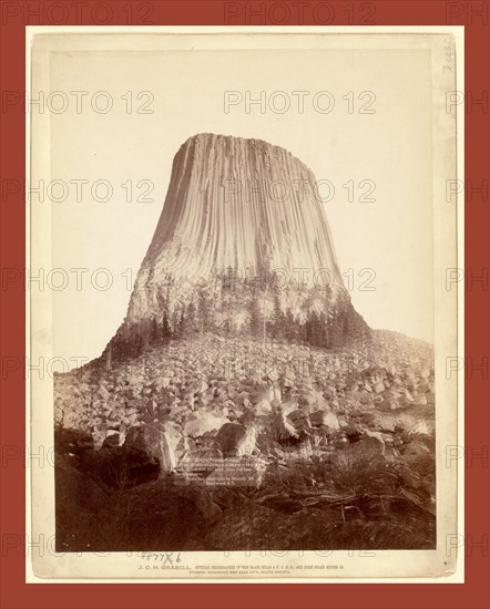 Devil's Tower. From W[est] side showing millions of tons of fallen rock. Tower 800 feet high from its base, John C. H. Grabill was an american photographer. In 1886 he opened his first photographic studio