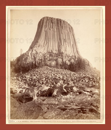 Devil's Tower. From West side showing millions of tons of fallen rock. Tower 800 feet high from its base, John C. H. Grabill was an american photographer. In 1886 he opened his first photographic studio