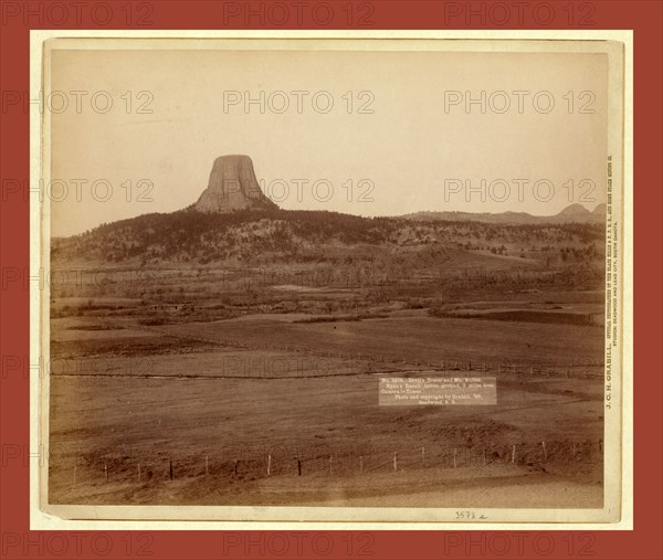 Devil's Tower and Mo. Buttes. Ryan's Ranch in foreground, 2 miles from Camera to Tower, John C. H. Grabill was an american photographer. In 1886 he opened his first photographic studio