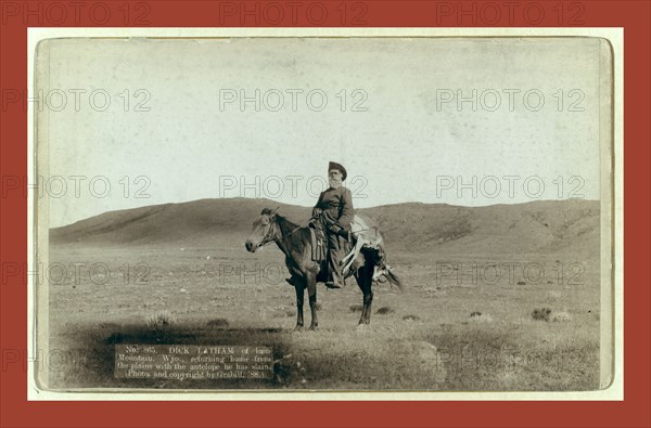 Dick Latham of Iron Mountain, Wyo., returning home from the plains with the antelope he has slain, John C. H. Grabill was an american photographer. In 1886 he opened his first photographic studio