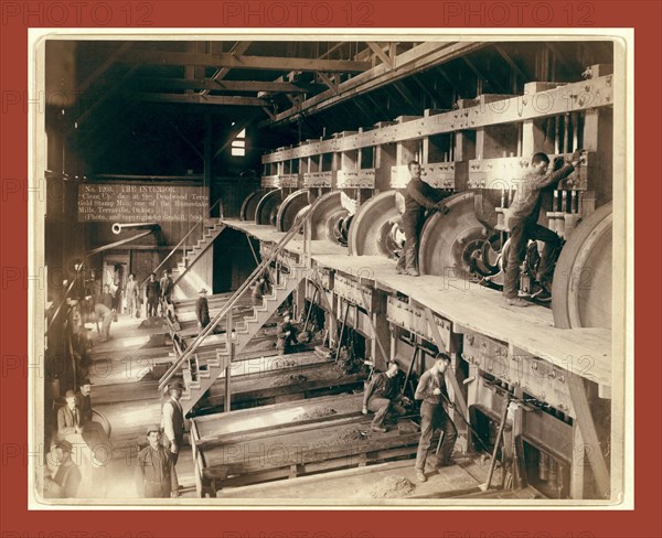 The Interior. Clean Up day at the Deadwood Terra Gold Stamp Mill, one of the Homestake Mills, Terraville, Dakota, John C. H. Grabill was an american photographer. In 1886 he opened his first photographic studio