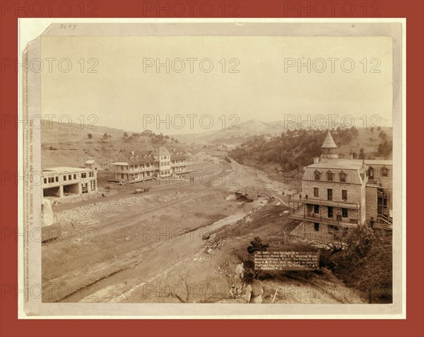 Hot Springs, S.D. From Club House Hill, S.E., showing Minnekahta and Gillespie Hotels. The Fremont, Elkhorn & M.V. Ry., with old town in distance, John C. H. Grabill was an american photographer. In 1886 he opened his first photographic studio