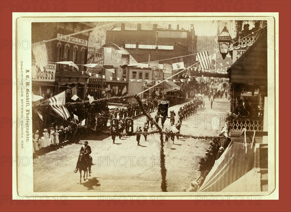 Jollification. Deadwood People celebrating the building of D.O.R.R. road to Lead City, John C. H. Grabill was an american photographer. In 1886 he opened his first photographic studio