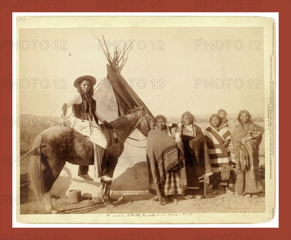 A pretty group at an Indian tent, John C. H. Grabill was an american photographer. In 1886 he opened his first photographic studio