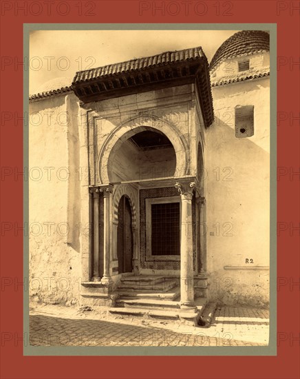 Tunis Gate College, Tunisia, Neurdein brothers 1860 1890, the Neurdein photographs of Algeria including Byzantine and Roman ruins in Tébessa and Thamugadi; mosques, shrines, public buildings, palaces, and street scenes in Mostaganem, Biskra, Algiers, Tlemcen, Constantine, Oran, and Sidi Bel AbbÃ¨s; and the cathedral at Carthage. Portraits of Algerian people include Berbers, Ouled NaÃ¯l women, and prisoners in Annaba. Tunisian views include mosques, buildings, and street scenes in Tunis.