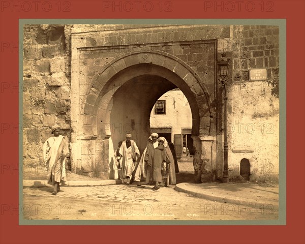 Tunis, La Porte de la Folle, Bab Menara, Tunisia, Neurdein brothers 1860 1890, the Neurdein photographs of Algeria including Byzantine and Roman ruins in Tébessa and Thamugadi; mosques, shrines, public buildings, palaces, and street scenes in Mostaganem, Biskra, Algiers, Tlemcen, Constantine, Oran, and Sidi Bel AbbÃ¨s; and the cathedral at Carthage. Portraits of Algerian people include Berbers, Ouled NaÃ¯l women, and prisoners in Annaba. Tunisian views include mosques, buildings, and street scenes in Tunis.