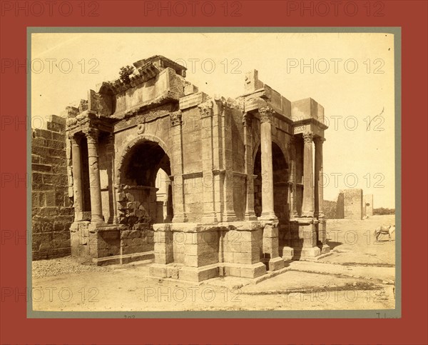 Tebessa, Arc de Triomphe quadrifrons Caracalla third century, Algiers, Neurdein brothers 1860 1890, the Neurdein photographs of Algeria including Byzantine and Roman ruins in Tébessa and Thamugadi; mosques, shrines, public buildings, palaces, and street scenes in Mostaganem, Biskra, Algiers, Tlemcen, Constantine, Oran, and Sidi Bel AbbÃ¨s; and the cathedral at Carthage. Portraits of Algerian people include Berbers, Ouled NaÃ¯l women, and prisoners in Annaba. Tunisian views include mosques, buildings, and street scenes in Tunis.