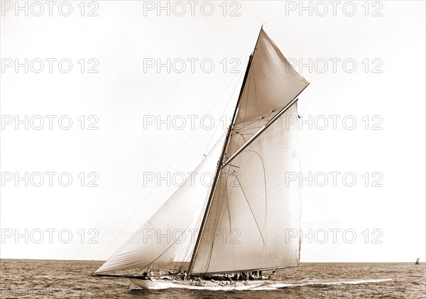 Columbia setting spinnaker boom, Oct. 3, 1899, Columbia (Sloop), Regattas, Yachts, 1899