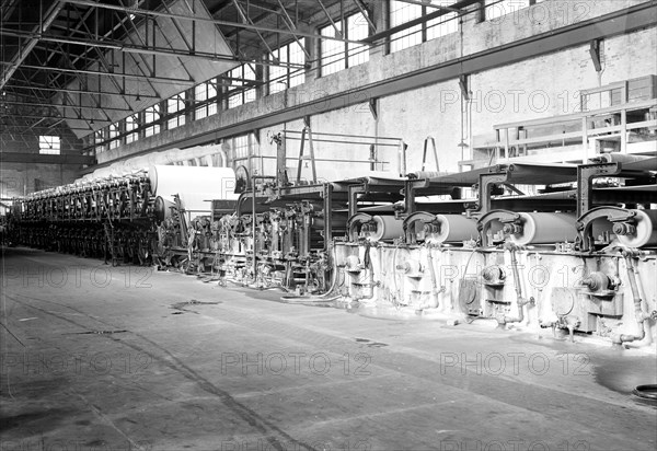 Mt. Holyoke, Massachusetts - Paper. American Writing Paper Co. Cylinder machines (making matchboard), 1936, Lewis Hine, 1874 - 1940, was an American photographer, who used his camera as a tool for social reform. US,USA