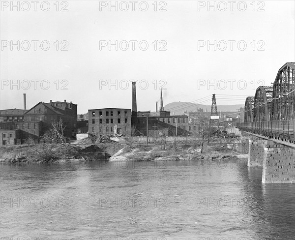 Mt. Holyoke, Massachusetts - Scenes. Plants of the pristine industries of the River-side, now housing textile and paper converting and accessories, 1936, Lewis Hine, 1874 - 1940, was an American photographer, who used his camera as a tool for social reform. US,USA