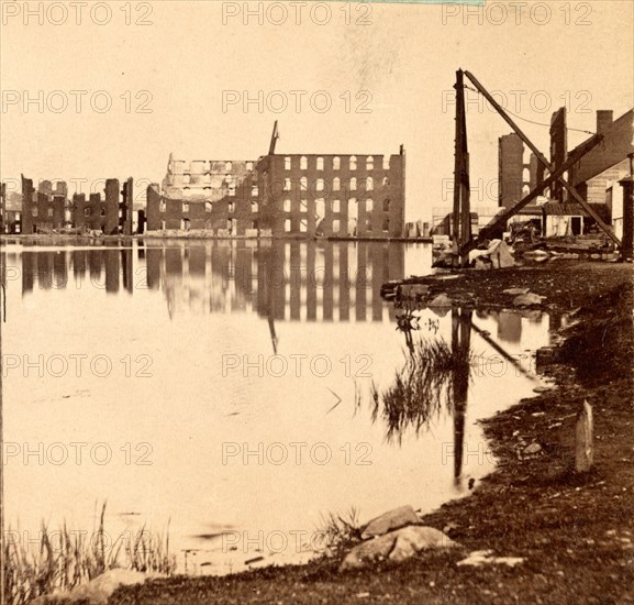 Ruins of the burnt district, from the canal basin, Richmond, Va., looking east, USA, US, Vintage photography