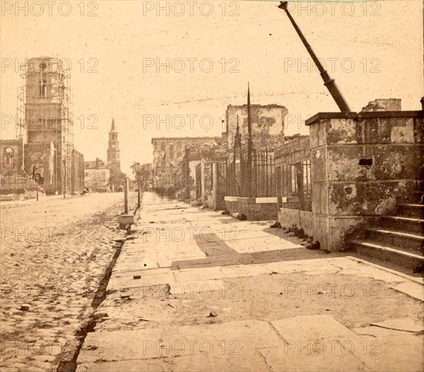 Meeting St., Charleston, S.C., looking South, showing the ruins of Circular church and the Mills House, St. Michael's church in the distance, USA, US, Vintage photography