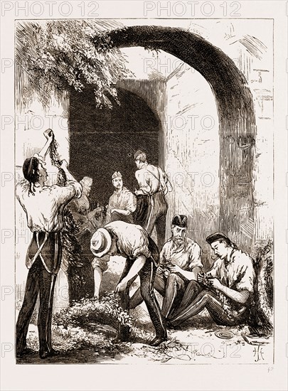 THE PRINCE OF WALES AT GIBRALTAR, 1876: SOLDIERS VAKING DECORATIONS IN THE OLD SALLY-PORT OF THE FORTRESS
