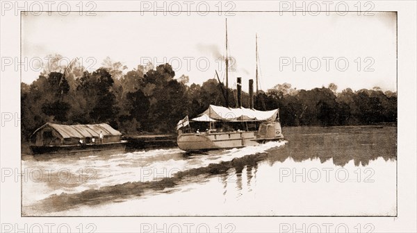 THE BENIN PUNITIVE EXPEDITION: A RIVER SCENE ON THE WAY TO THE KING'S CAPITAL; H.M.S. "ALECTO" ON THE BENIN RIVER, 1897