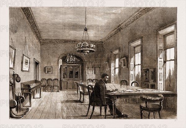 THE LAND AGITATION IN IRELAND, THE NEW COMMITTEE-ROOM OF THE LAND-LEAGUE IN DUBLIN, 1881, Mr. Michael Davitt; The model of the Man-of-war seen above the Cabinet was presented to Mr. Davitt by the Lady Land-Leaguers of New York, and is intended to be emblematical of the Fleet which will be sent to rescue Ireland.