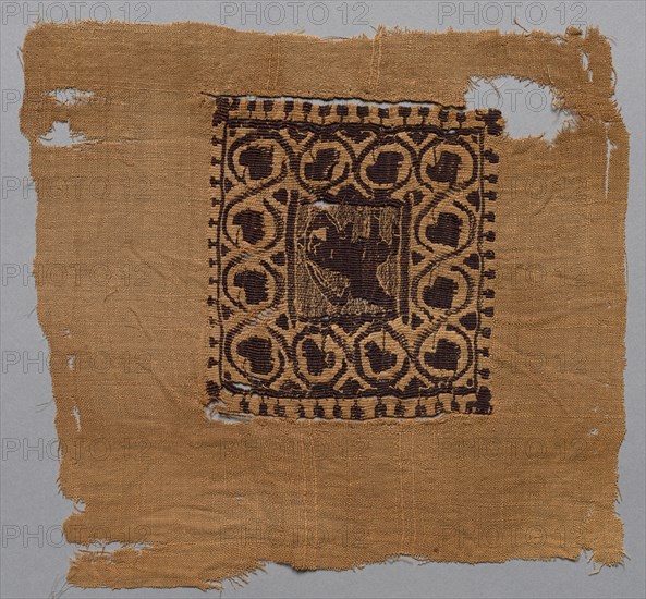 Fragment, with Segmentum, from a Tunic, 500s. Egypt, Byzantine period, 6th century. Tabby weave, inwoven tapestry ornament; wool and linen; overall: 23.5 x 22.3 cm (9 1/4 x 8 3/4 in.).