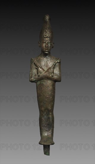 Statuette of Osiris, 664-525 BC. Egypt, Late Period, Dynasty 26 or later. Black copper (?), hollow cast; overall: 6.8 x 4.7 cm (2 11/16 x 1 7/8 in.); with tang: 30.6 cm (12 1/16 in.); without tang: 28 cm (11 in.).