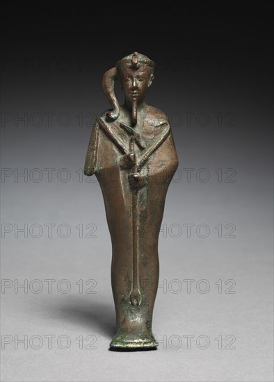 Statuette of Khonsu, 664-525 BC. Egypt, Late Period, Dynasty 26 or later. Bronze, solid cast; overall: 5.4 x 3.7 cm (2 1/8 x 1 7/16 in.); with tang: 17.4 cm (6 7/8 in.).