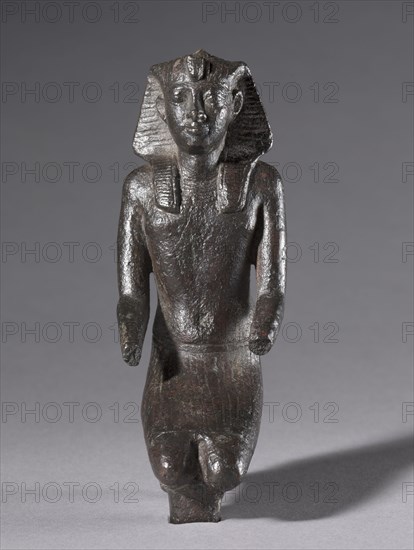 Statuette of Kneeling King, 304-30 BC. Egypt, Greco-Roman Period, Ptolemaic Dynasty. Bronze, solid cast; overall: 4.2 x 5.5 cm (1 5/8 x 2 3/16 in.); with tang: 12.7 cm (5 in.); without tang: 11 cm (4 5/16 in.).