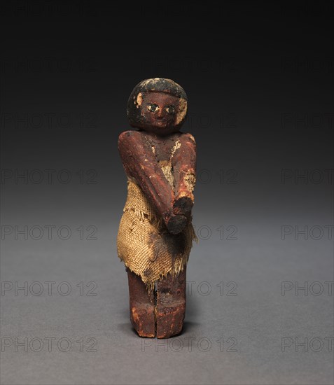 Seated Model Sailor, c. 2000-1000 BC. Egypt, Middle Kingdom, late Dynasty 11 (2040-1980 BC) to early Dynasty 12 (1980-1951 BC). Painted sycamore fig; average: 11 cm (4 5/16 in.).