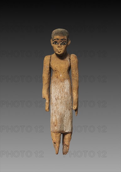 Model Figure of a Man, Perhaps a Boat Attendant, 2040-1648 BC. Egypt, Perhaps Meir, Middle Kingdom, 2040-1648 BC. Painted sycamore fig; overall: 11 x 3 x 2.1 cm (4 5/16 x 1 3/16 x 13/16 in.).